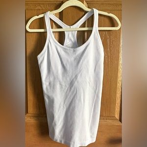 Lululemon EBB TO STREET TANK light lavender in color
Size 8. Next day shipping